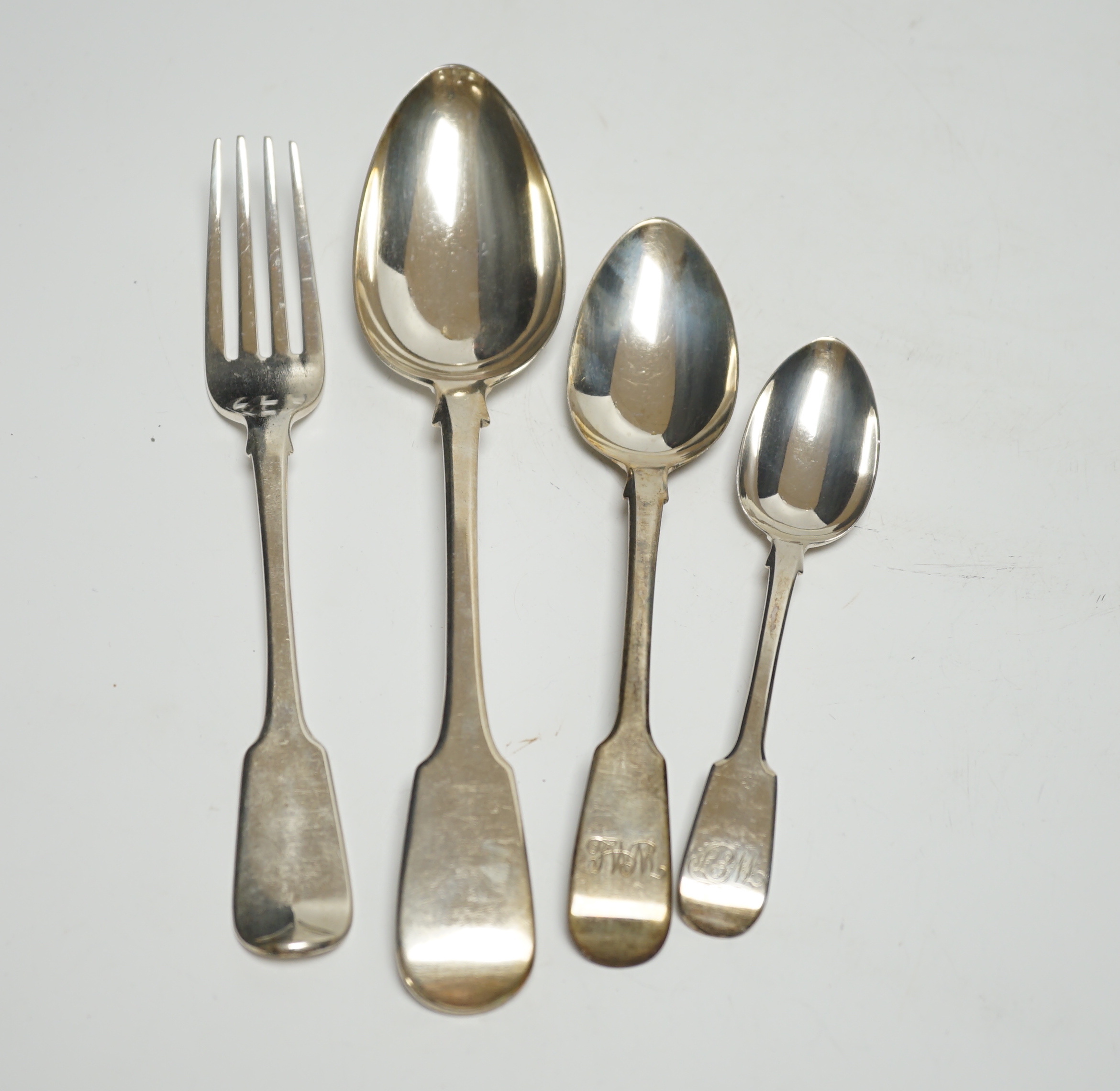 A harlequin canteen of 19th century silver fiddle pattern flatware, comprising fifty eight items, various dates and makers